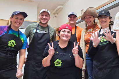 emerging leaders volunteer give back at community cafe serving meals food bank october 2024 meagan jesse ramos paige meyer ryan wilinski kate baer nicole brown